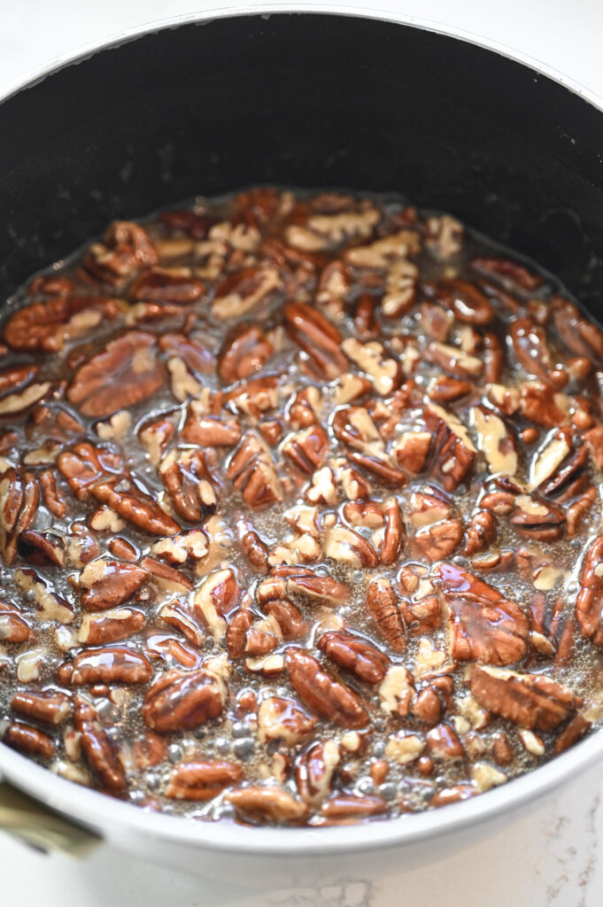 A pecan pie sauce in a saucepan.