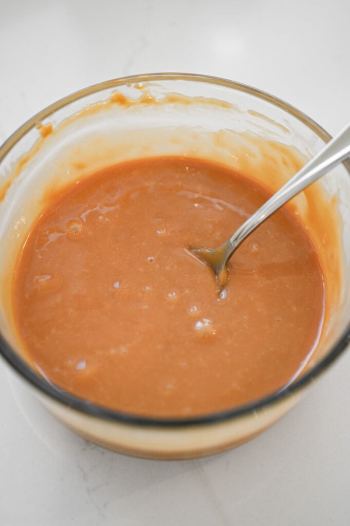 Caramel in a glass bowl.