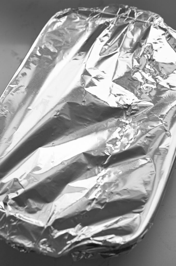 A 9x13-inch pan covered in aluminum foil.
