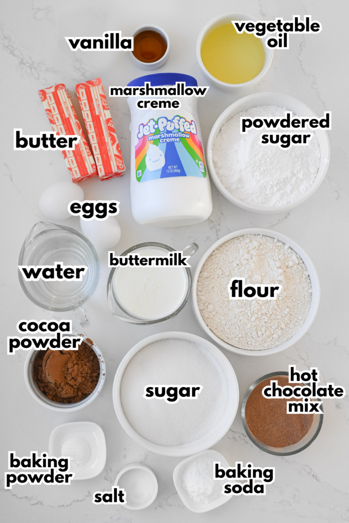 The ingredients needed to make hot chocolate cupcakes on a white background.