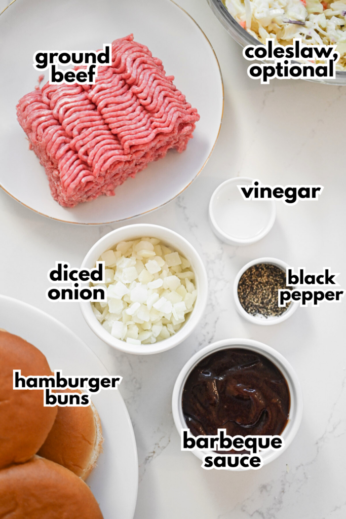 The ingredients needed for bbq sloppy joes on a white quartz background.