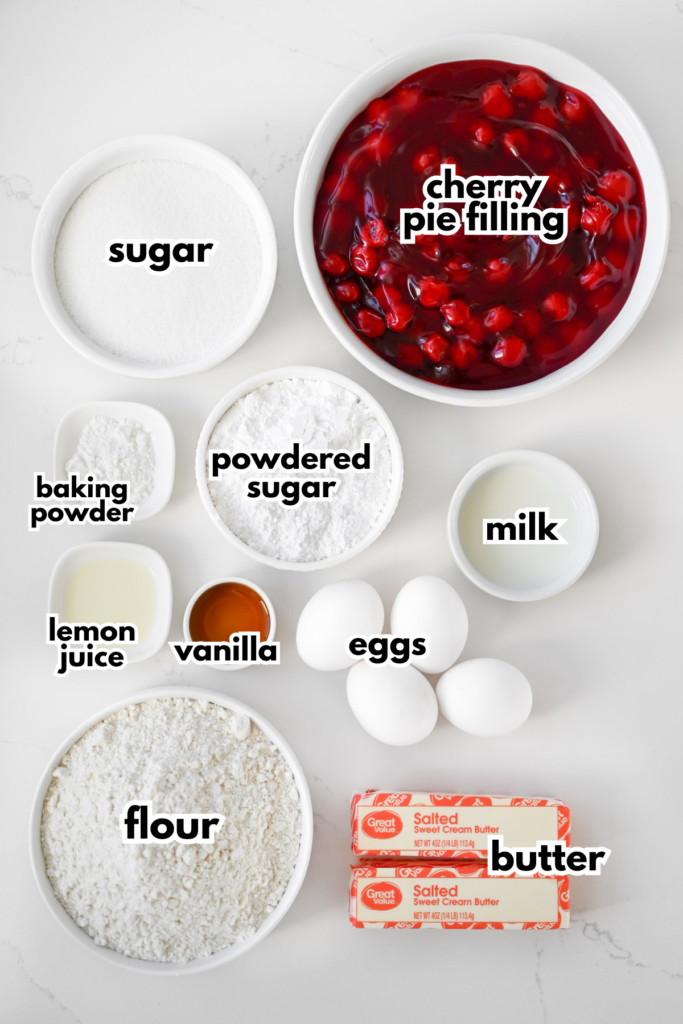 The ingredients needed to make Cherry Dessert Bars with icing all labeled on a white background.