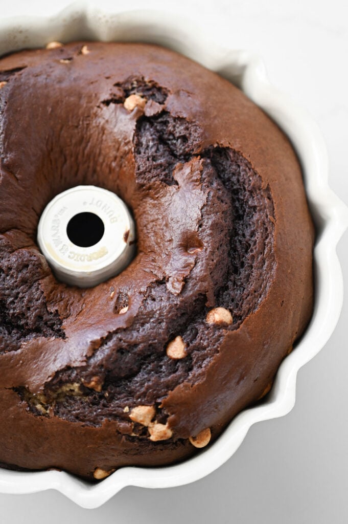 A chocolate bundt cake with peanut butter chips throughout.