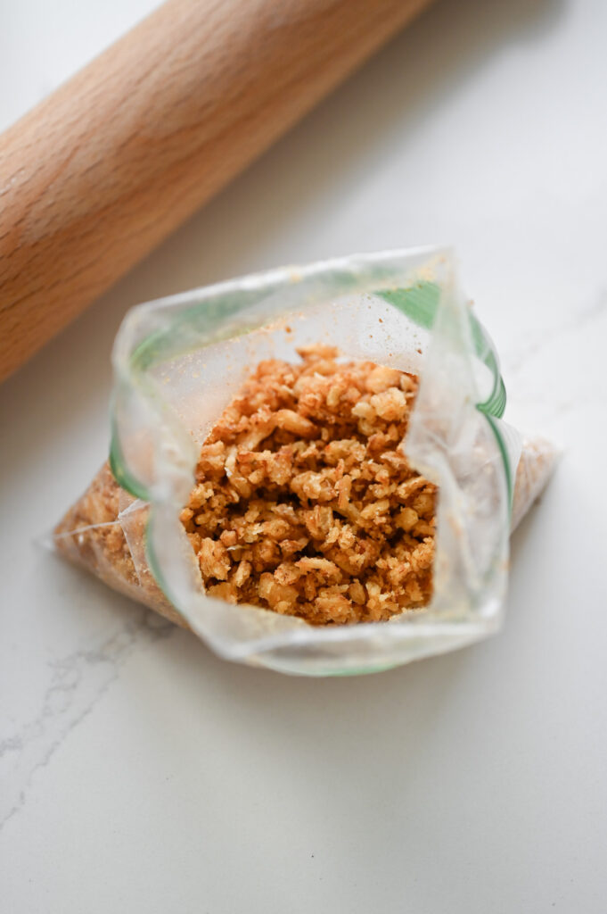 French fried onions in a resealable baggie with a rolling pin on the side.