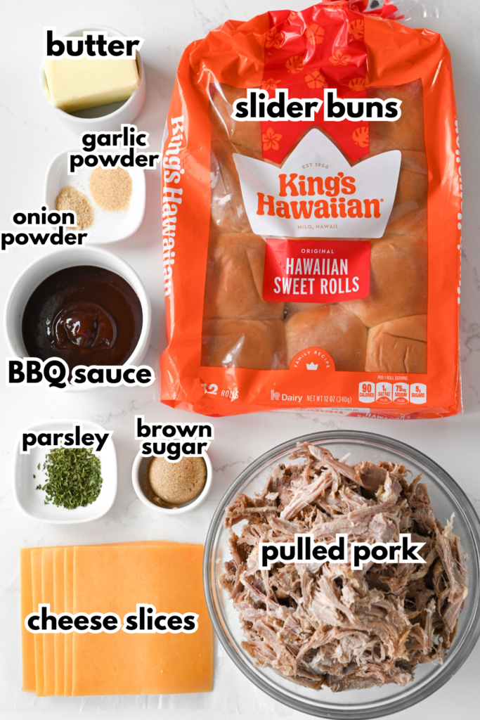 The ingredients needed to make a cheesy bbq pulled pork slider on a white background.