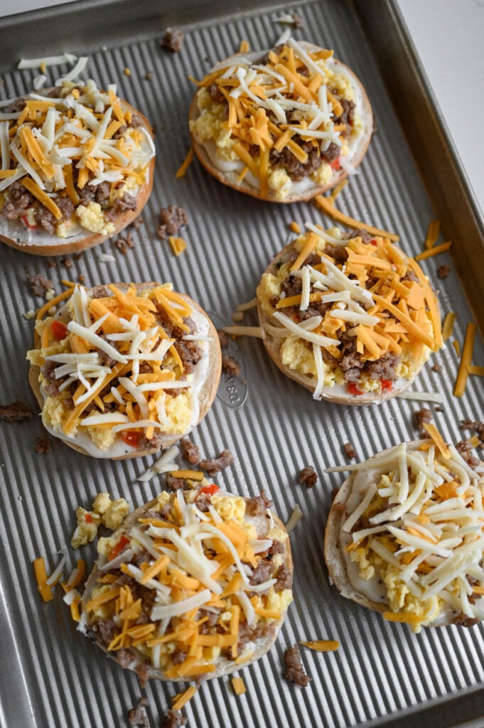 Pizza bagels ready to go into the oven.