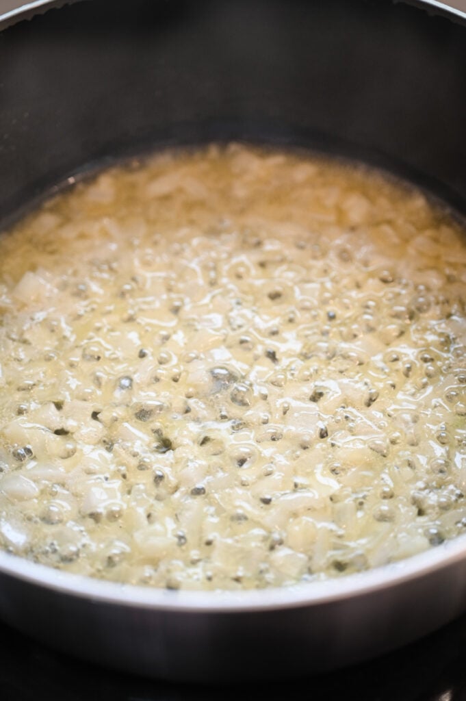 Diced onions sautéing in butter.
