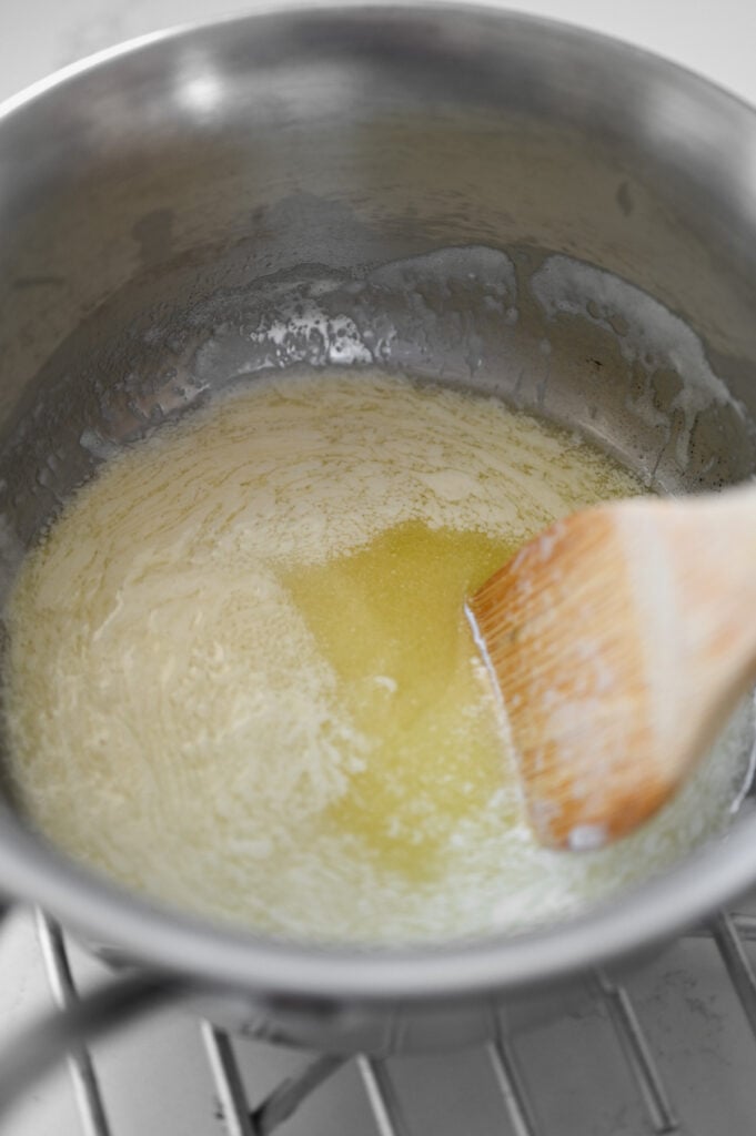 Butter melted in a saucepan.