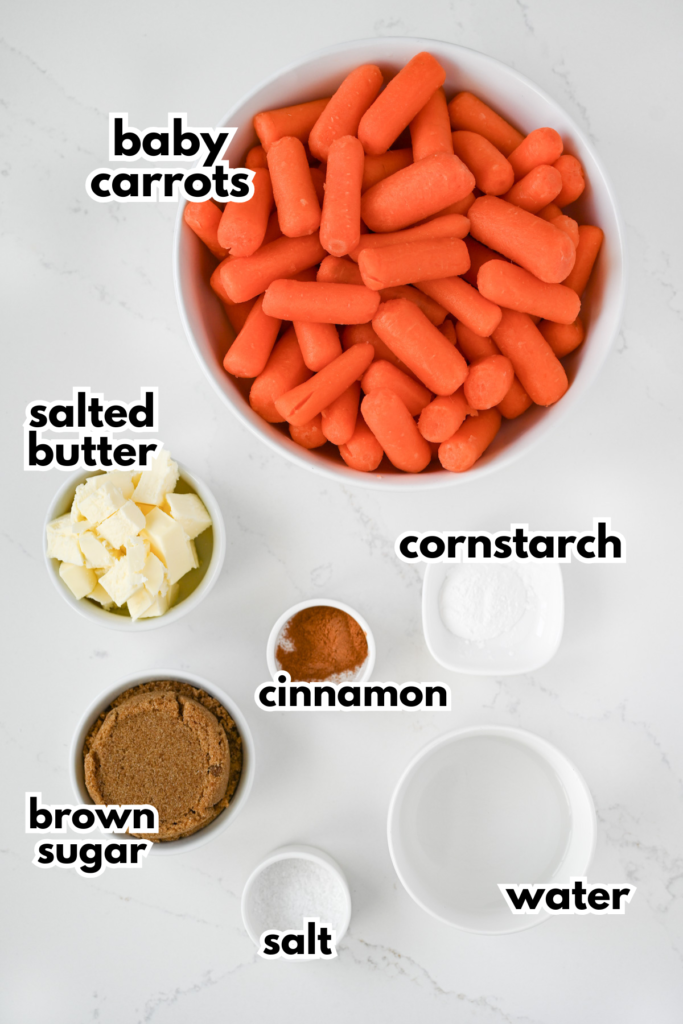 The ingredients needed to make slow cooker glazed carrots on a white background.