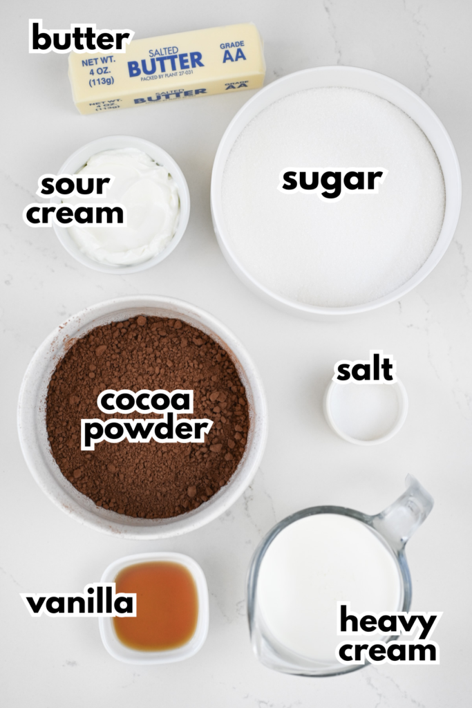 The ingredients for a chocolate frosting on a white background.