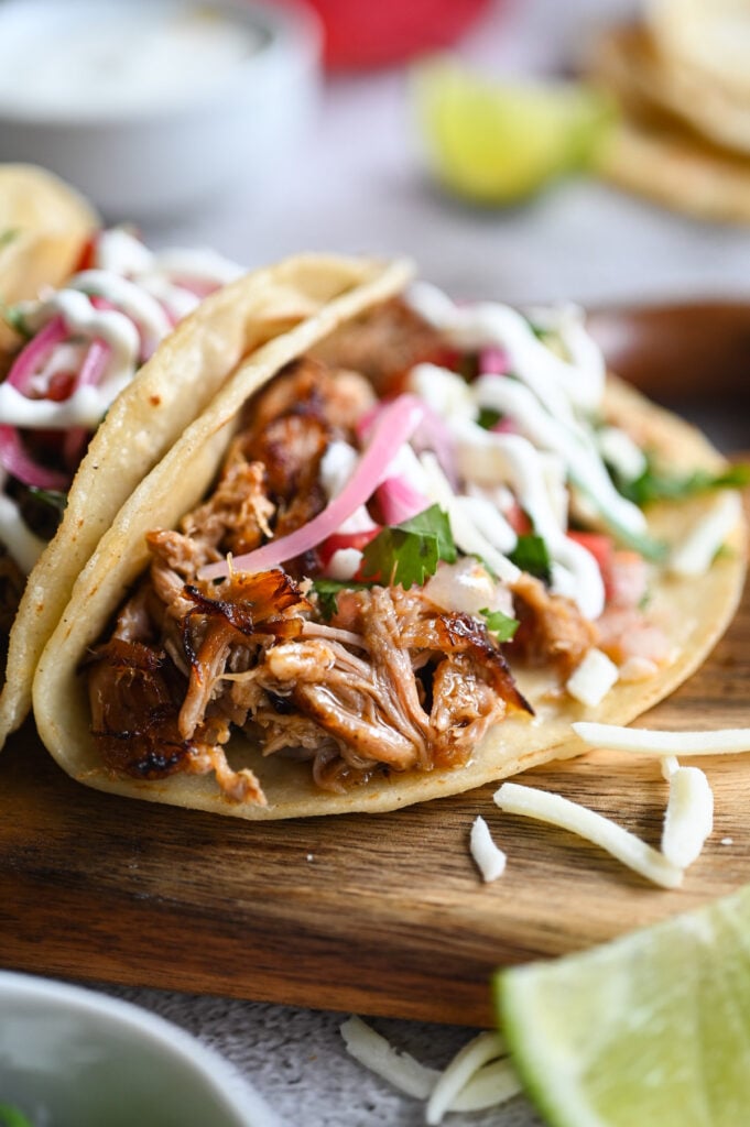 A taco filled with carnitas meat.