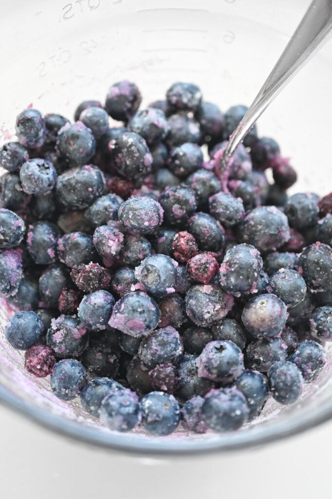 Fresh blueberries combined with sugar and cornstarch.